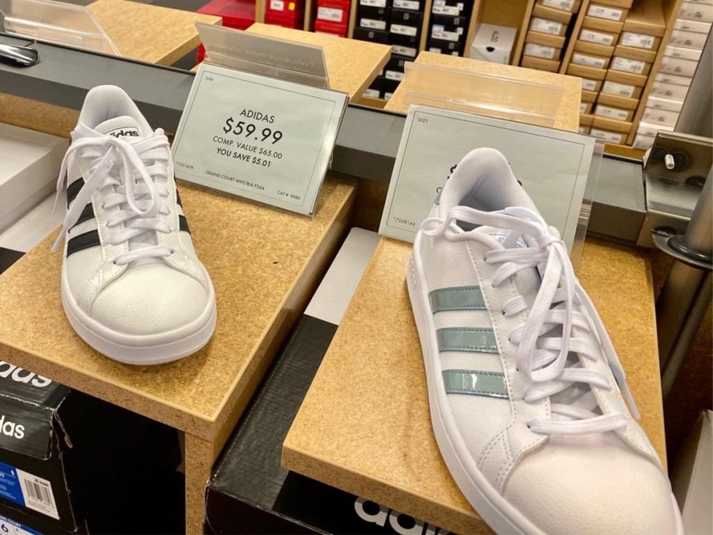 adidas sneakers in black and silver stripes in store