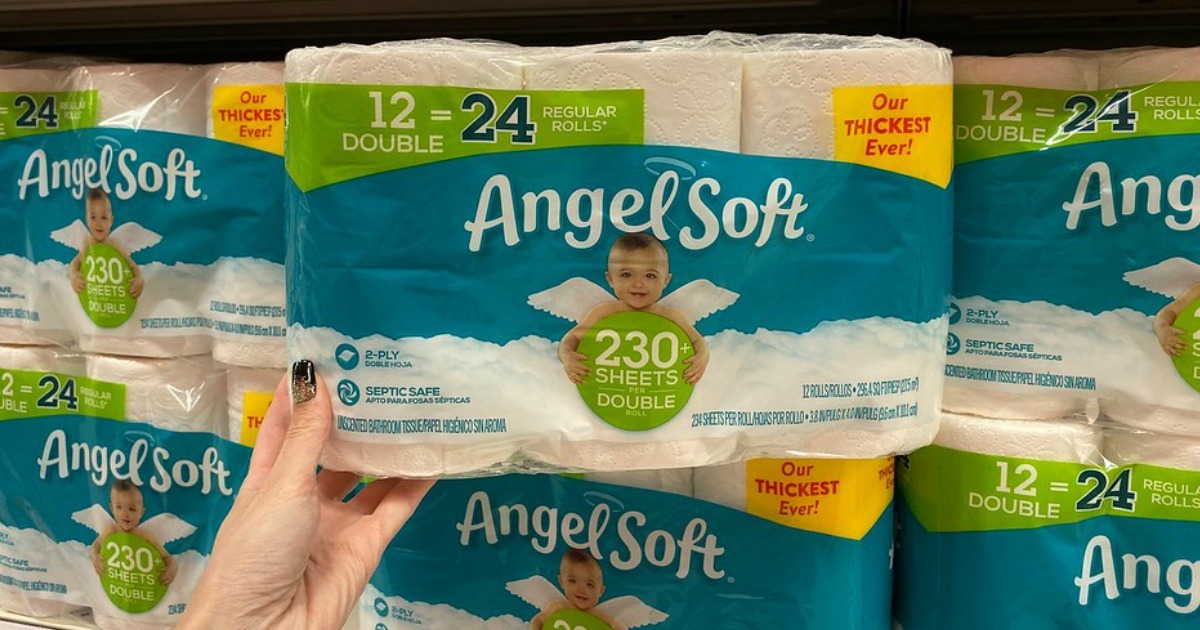 Angel Soft Toilet Paper pack, held by a hand, in store