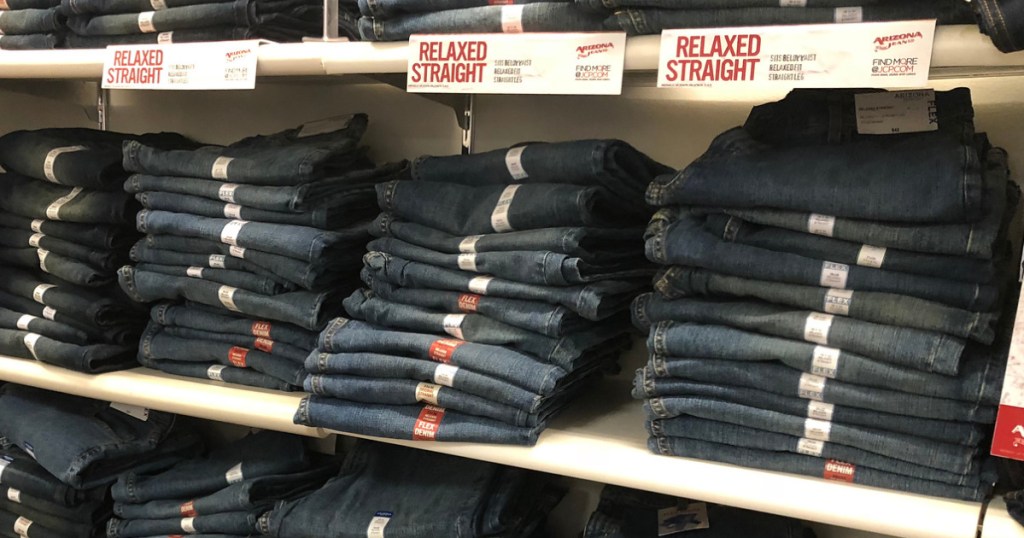 Arizona Men's Jeans stacked and folded on display in-store 