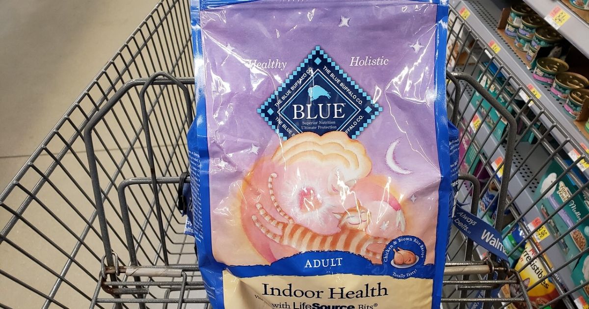 shopping cart with blue buffalo cat food in front basket 