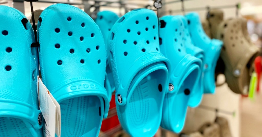 Blue Crocs hanging in store