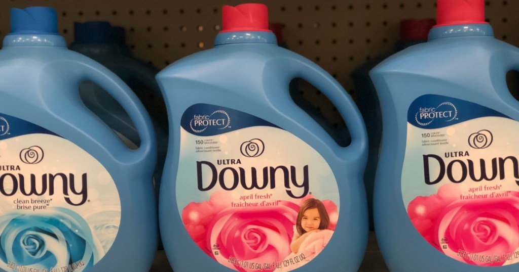 bottles of Downy Fabric Conditioners on shelf at a store