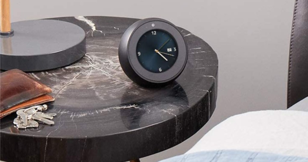 smart alarm clock on bedside table