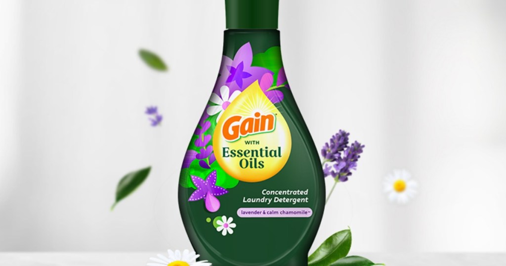 bottle of gain with flowers around it