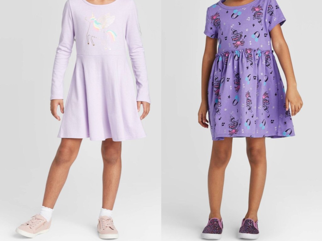 girl in lilac unicorn dress and purple troll dress