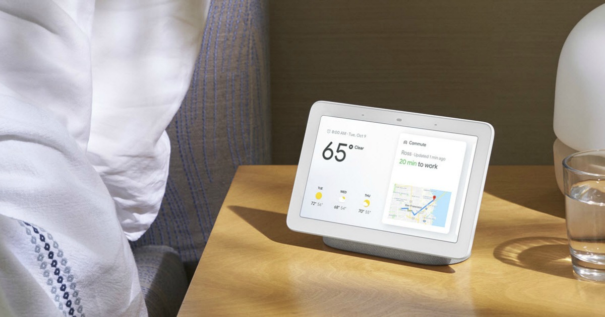 google nest hub display on nightstand by bed