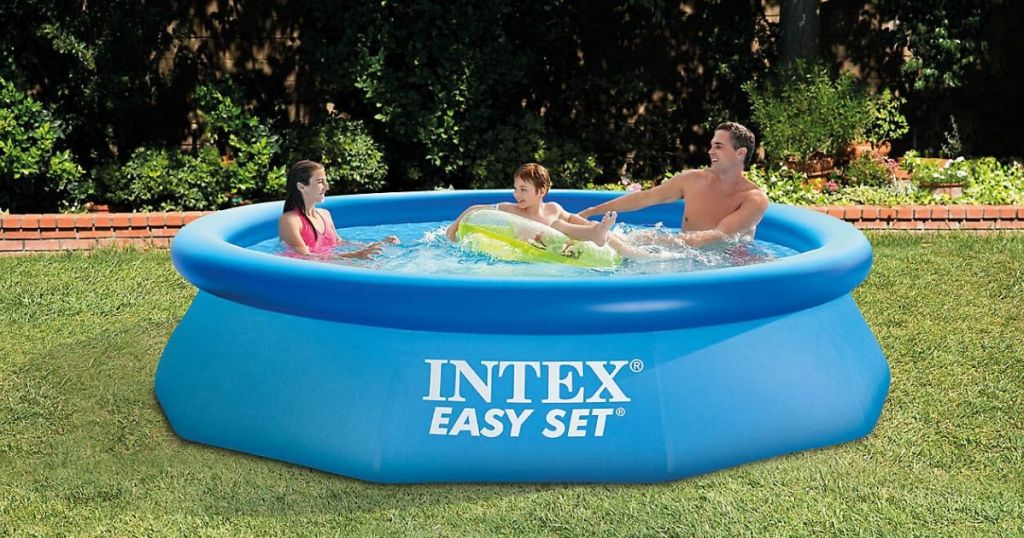easy set inflatable pool with family of 3 in it