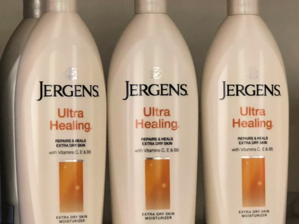 three jergens ultra healing lotion bottles on shelf