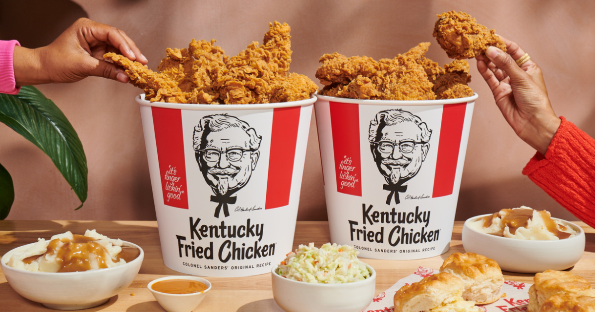 KFC food in buckets and on a table