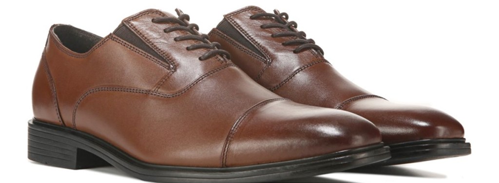 pair of brown leather men's oxford dress shoes