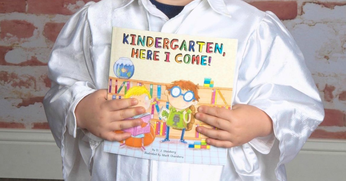 Kid holding Kindergarten Here I Come Book