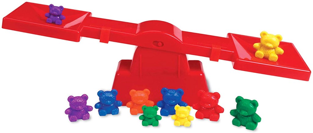 children's red plastic balance scale toy with multi-colored plastic bears