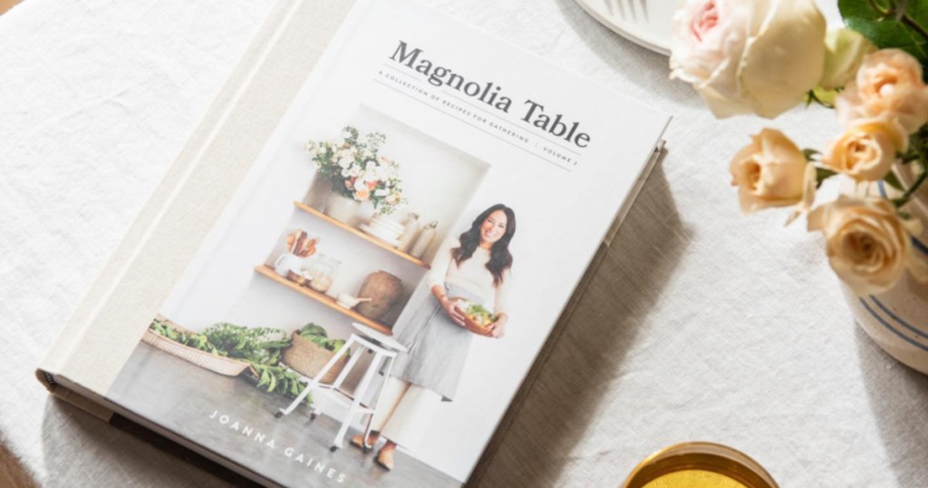 cookbook on table with flowers