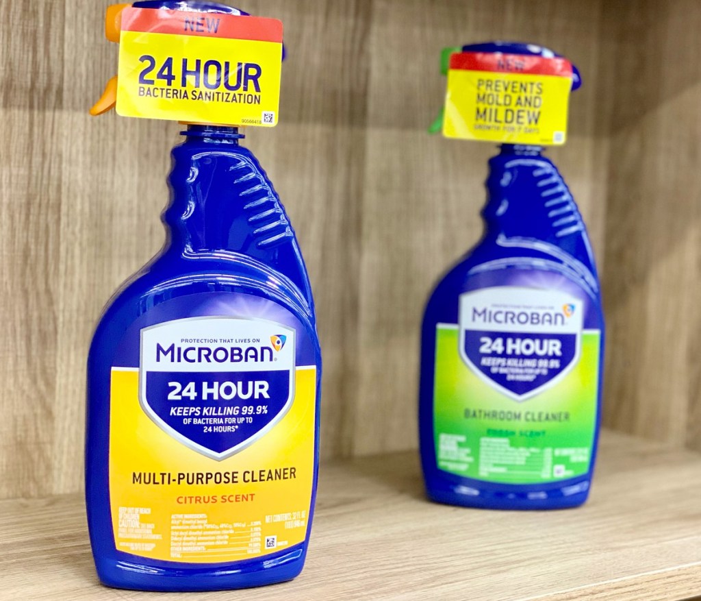 two blue bottles of microban brand disinfectant sprays