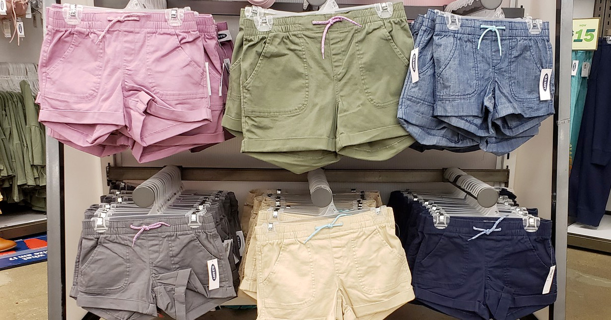 store display racks of colorful pairs of girls shorts