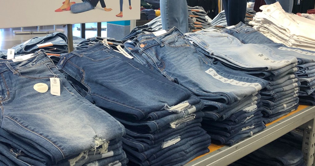 store display table of different washes of jeans