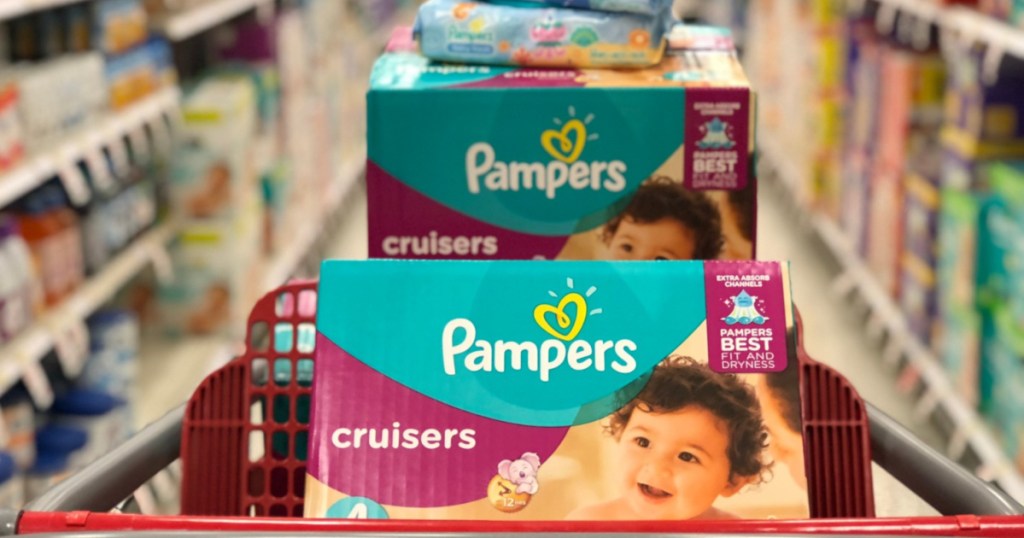 large boxes of diapers in cart in store aisle