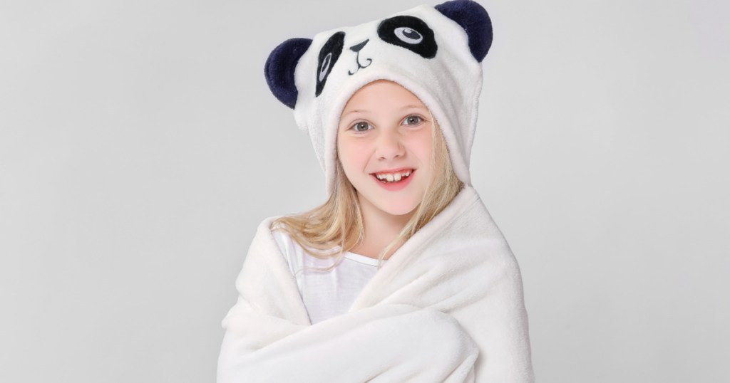 girl wearing panda hooded throw blanket