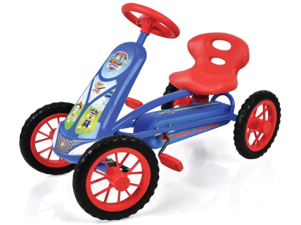 young child's blue and red pedal go kart with tv show characters on front