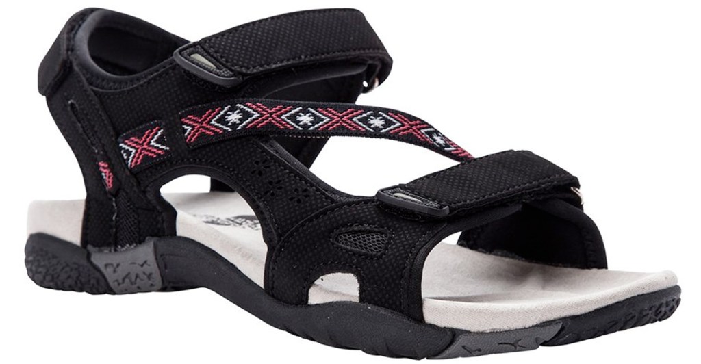 black leather womens walking sandal with red and black print strap