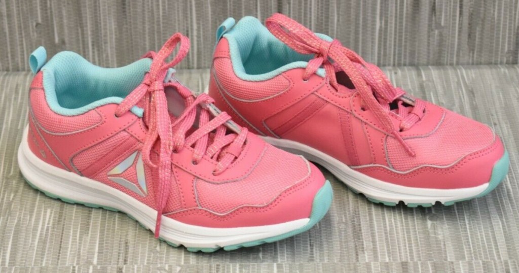 pink and teal kids running shoes