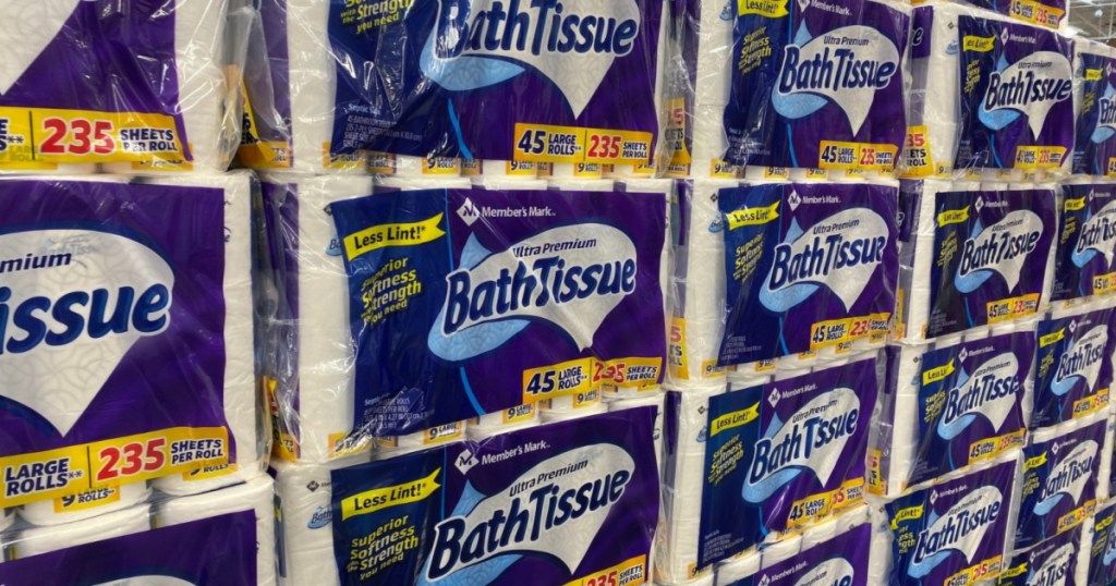 large packages of toilet paper stacked high in store