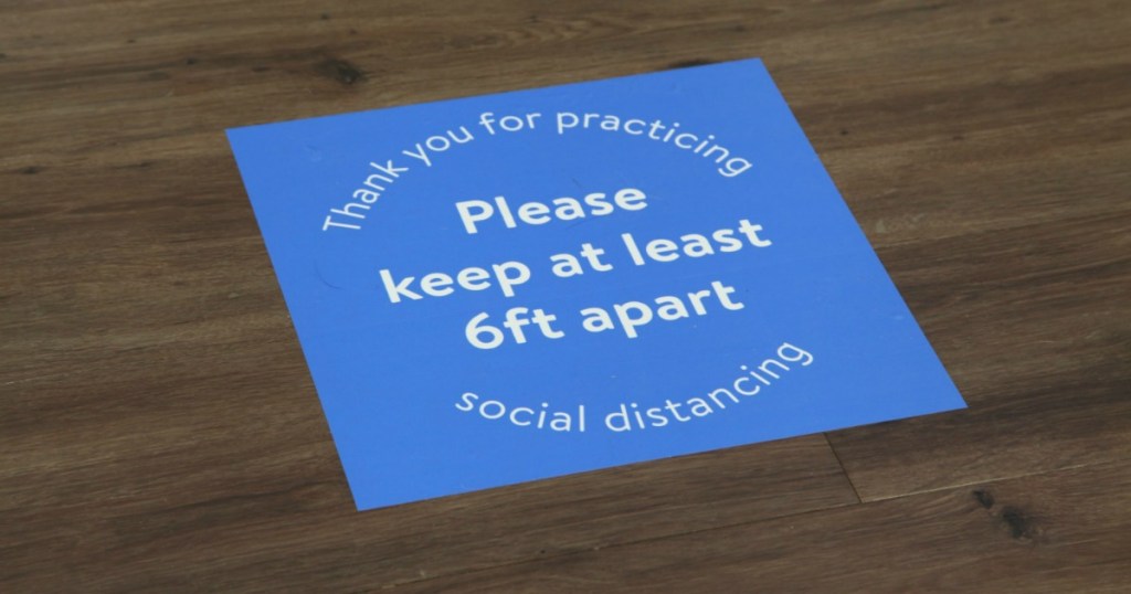 Social Distancing Sign on floor