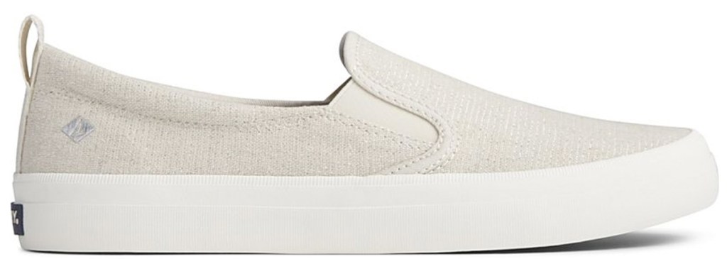 beige colored linen slip-on sneakers with white soles