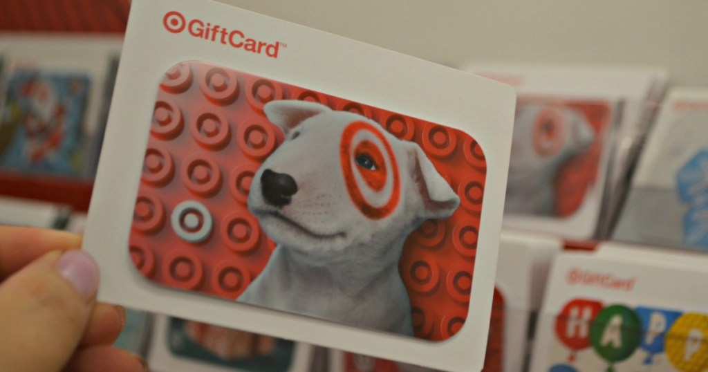 Person holding Target gift card in store