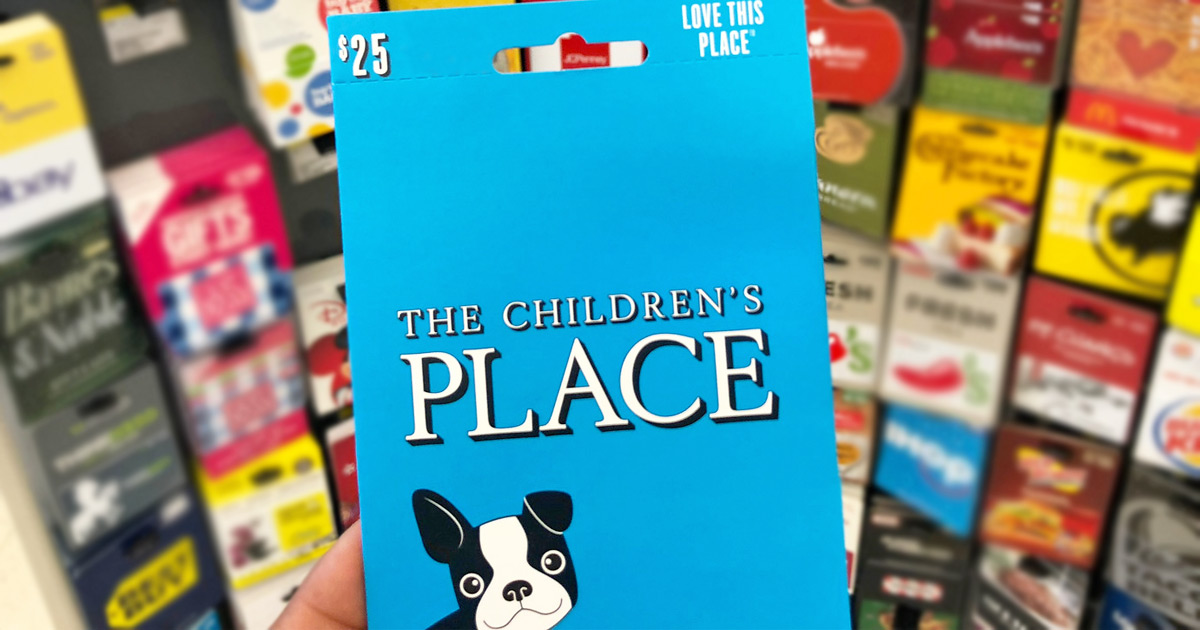 person holding up blue $25 childrens place gift card