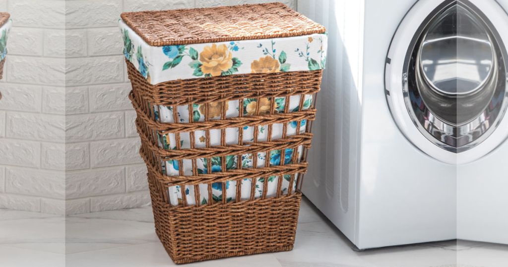 the pioneer woman maize hamper in laundry room with washer machine next to it