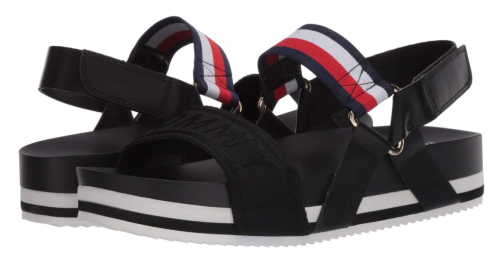 black women's sandals with red, white, and blue strap