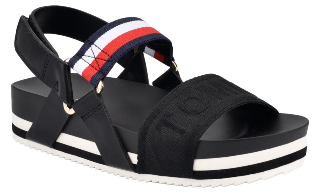 black women's sandal with red, white, and blue strap