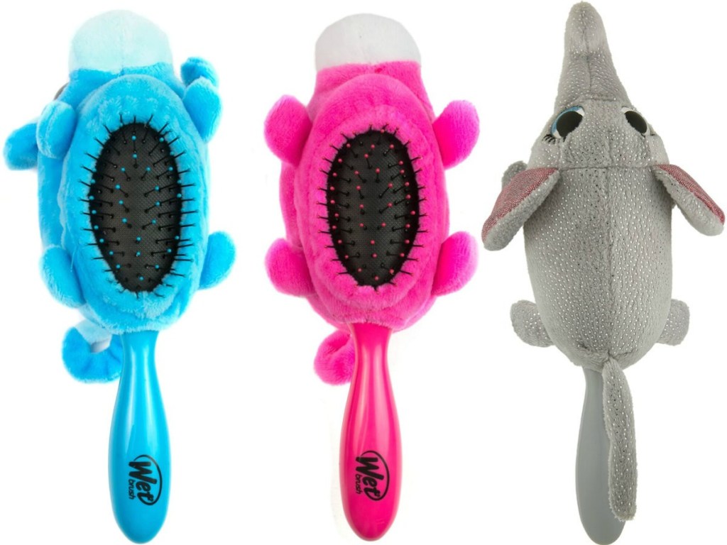 Three animal themed plush hair brushes