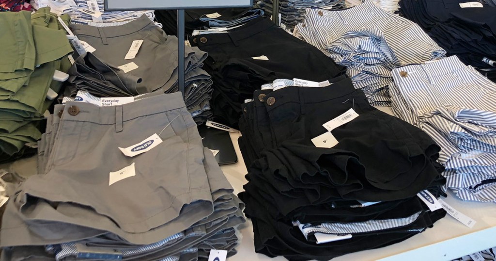 store display table full of womens shorts in grey and black colors