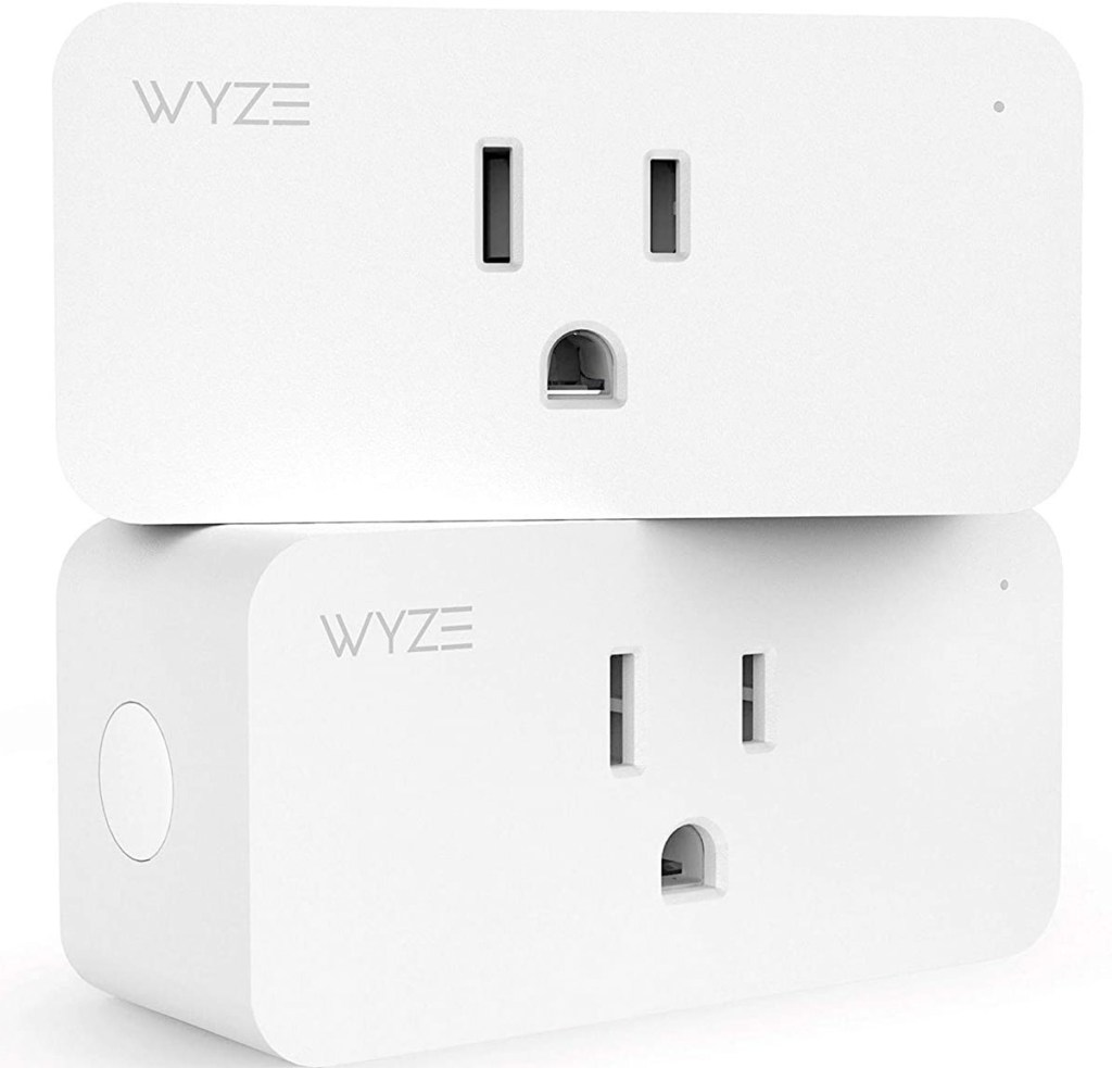 two white wyze brand smart plugs stacked on top of each other