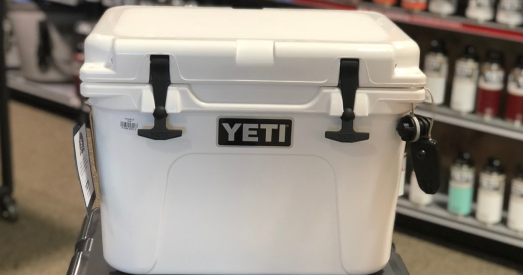 white cooler on top of black cooler in store