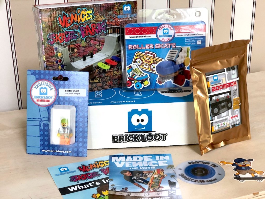brickloot box with various lego toys surrounding it