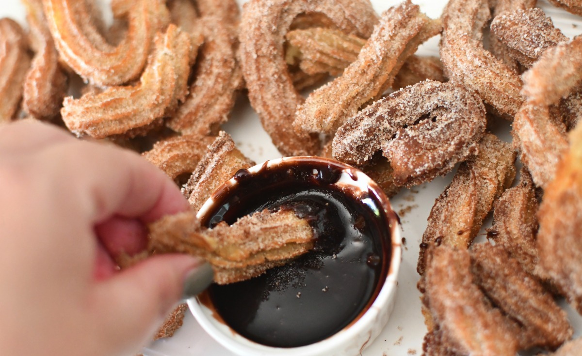 churros in melted chocolate