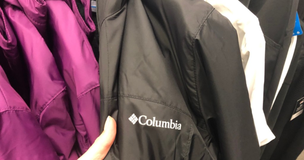 finger pointing at black Columbia Jacket