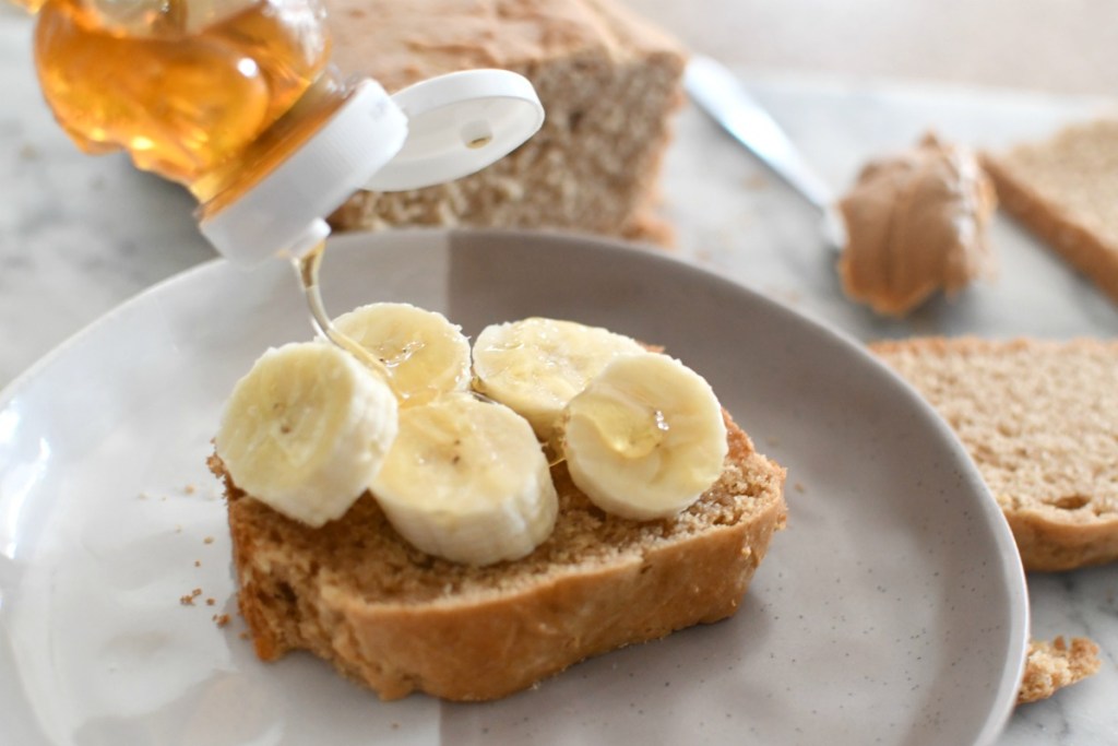 drizzle of honey and banana on peanut butter bread