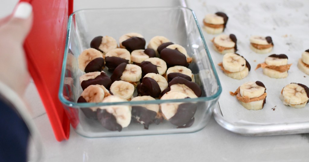 food container with chocolate dipped peanut butter bananas