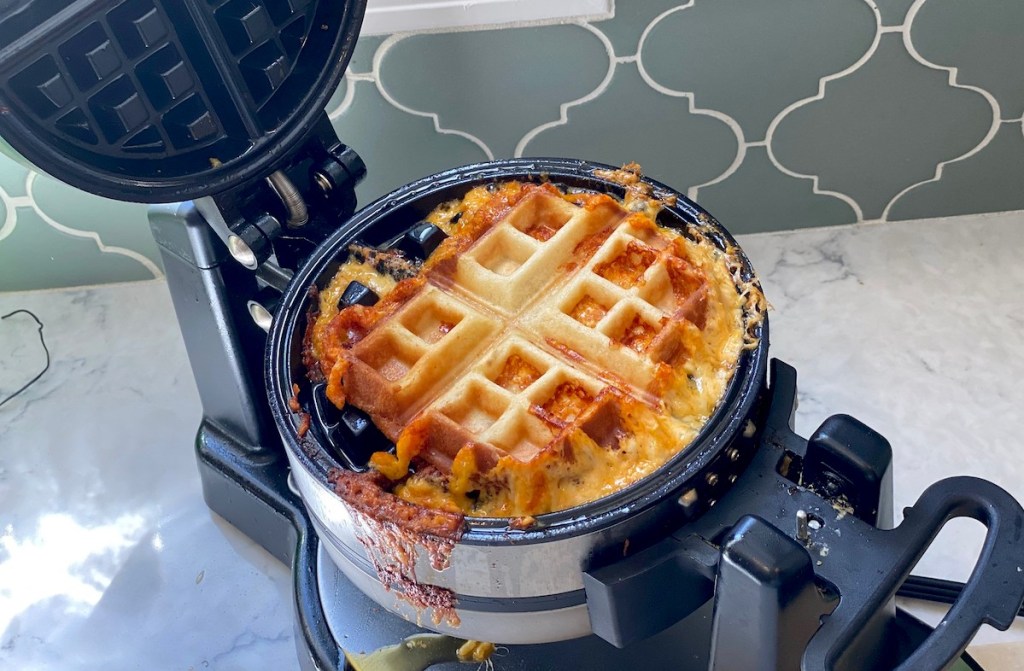 browned grilled cheese in open waffle maker
