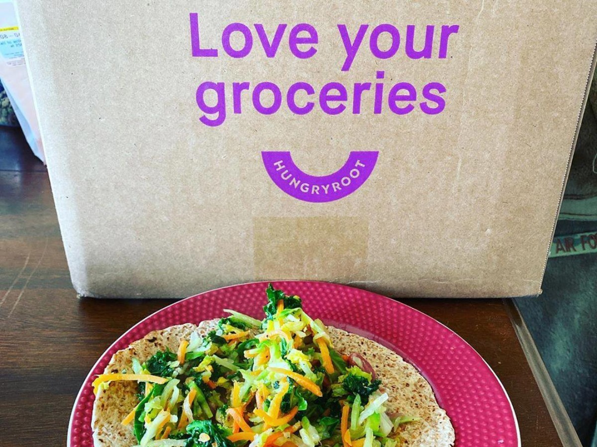 Hungryroot shipping box next to vegetarian wrap free organic grocery delivery services