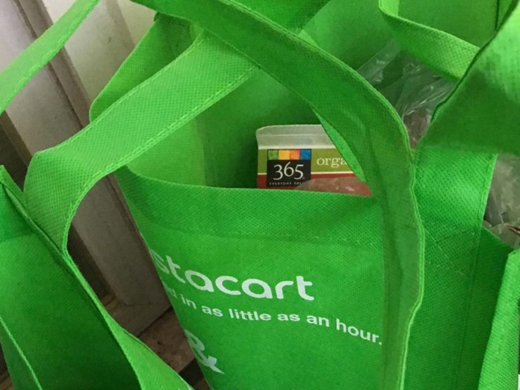 green bags full of groceries