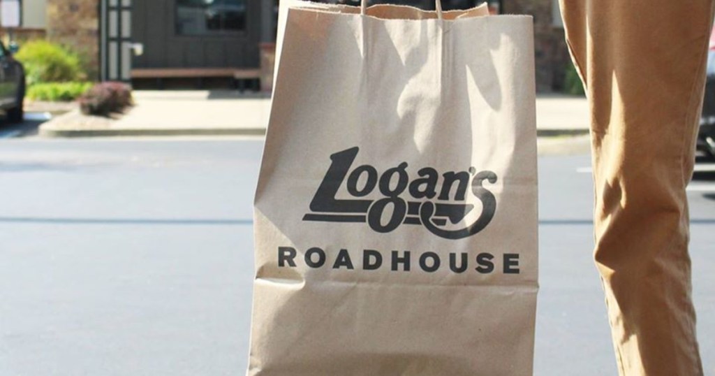 person carrying Logans Roadhouse bag