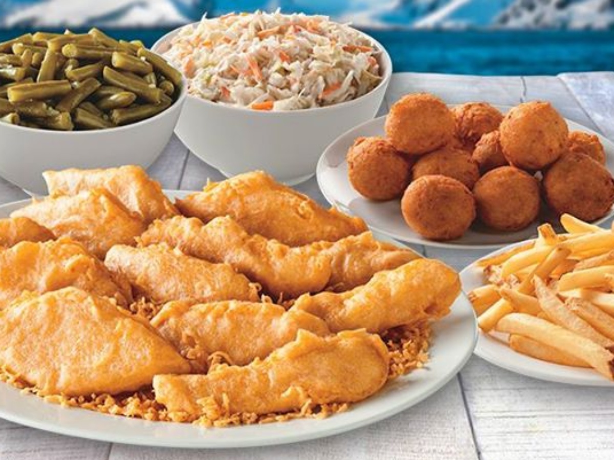 Long John Silver's Family Meal with 12 pieces of fish, hush puppies, fries and two bowls of green beans and coleslaw