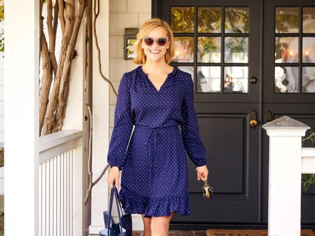 Reese Witherspoon in sunglasses and blue dress