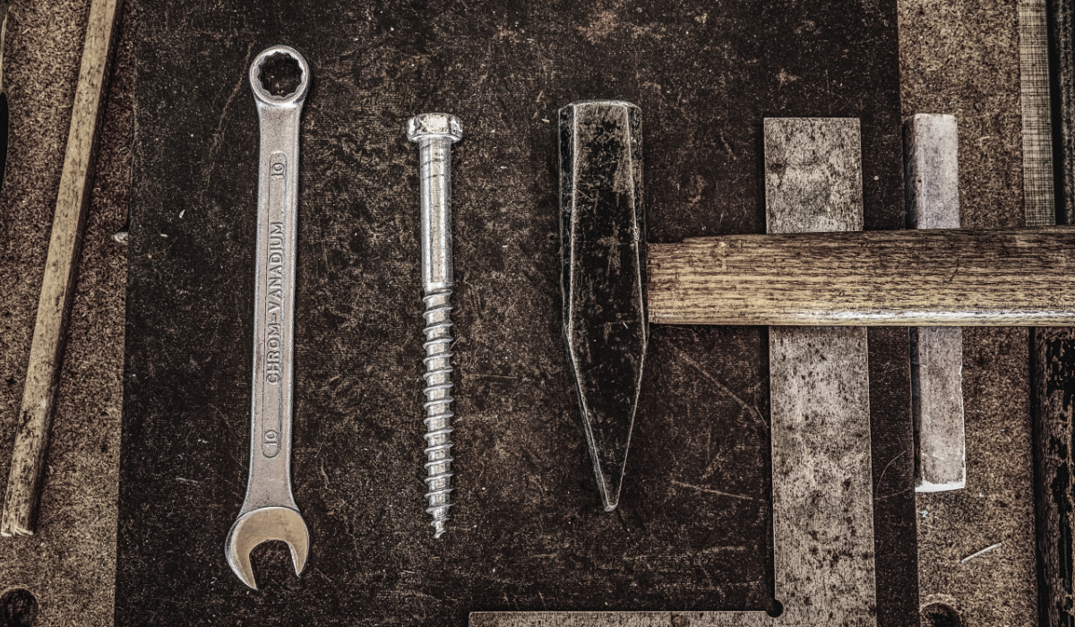 rusty tools on a metal surface