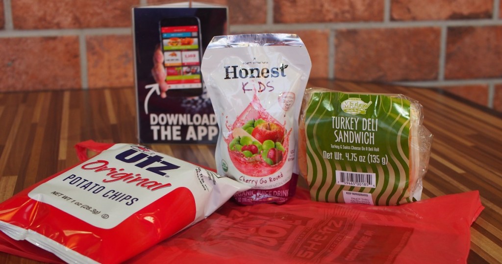 chips, juice box, and packaged sandwich